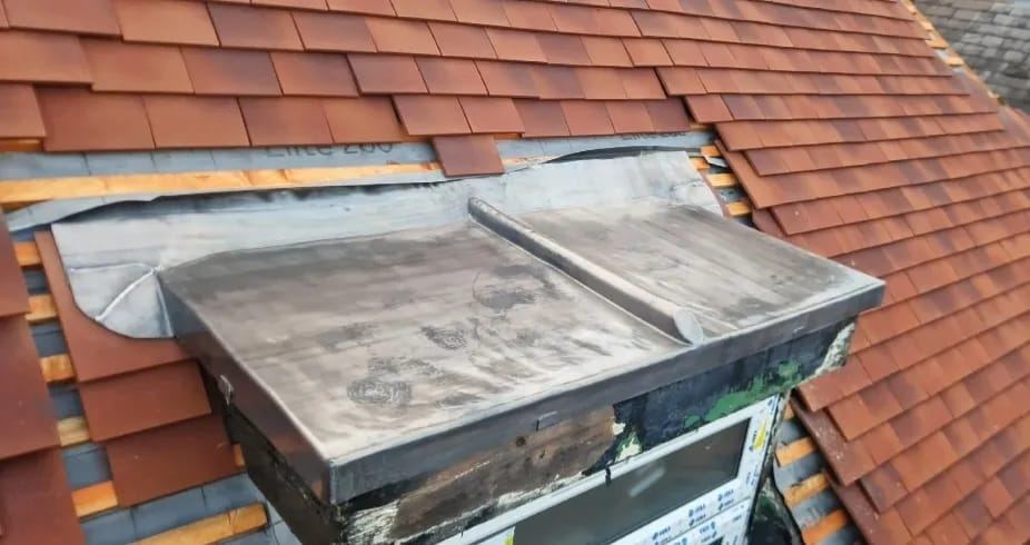 Finished lead work around a roof window