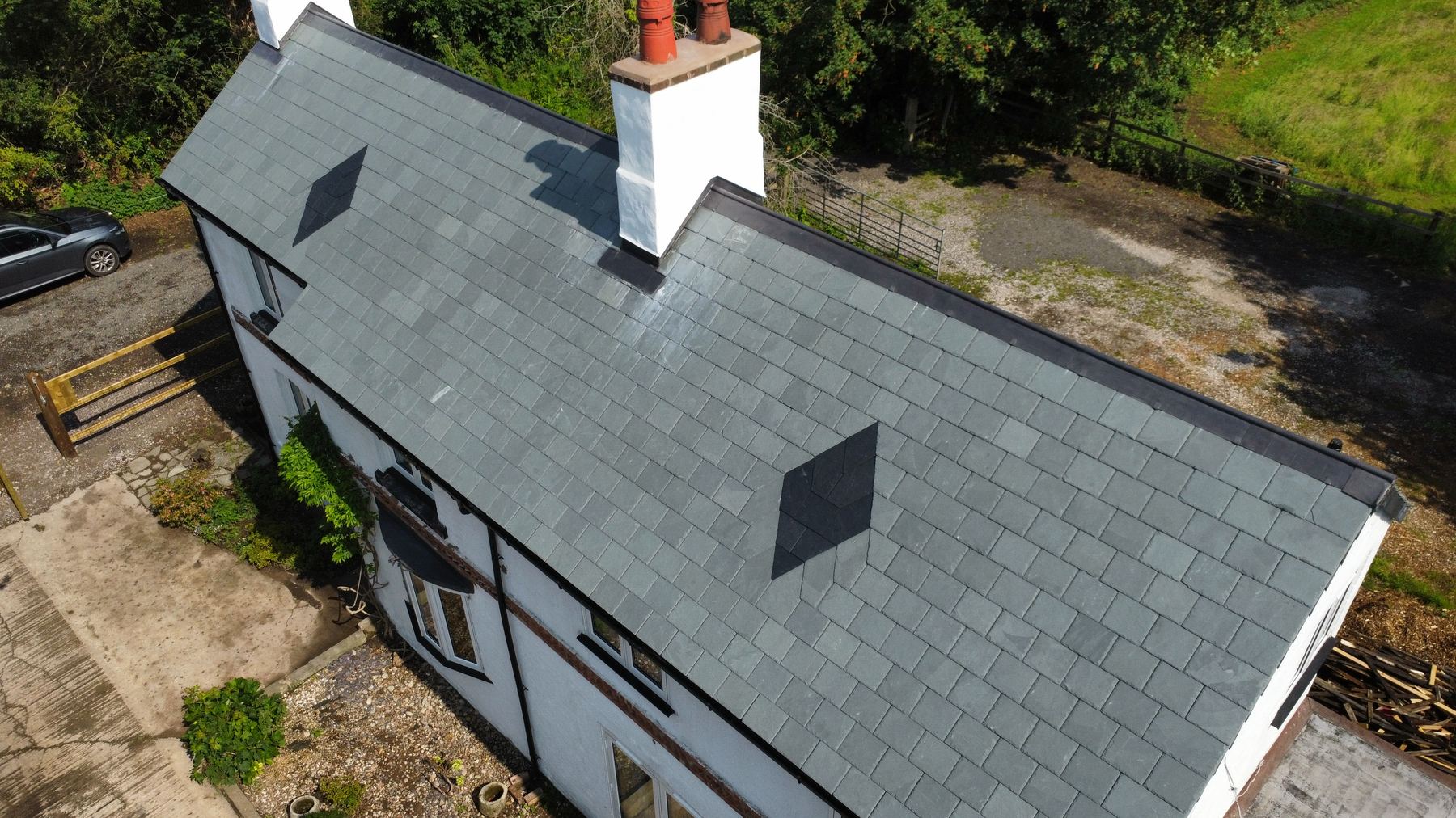 Completed slate roof by MP Bespoke Roofing LTD